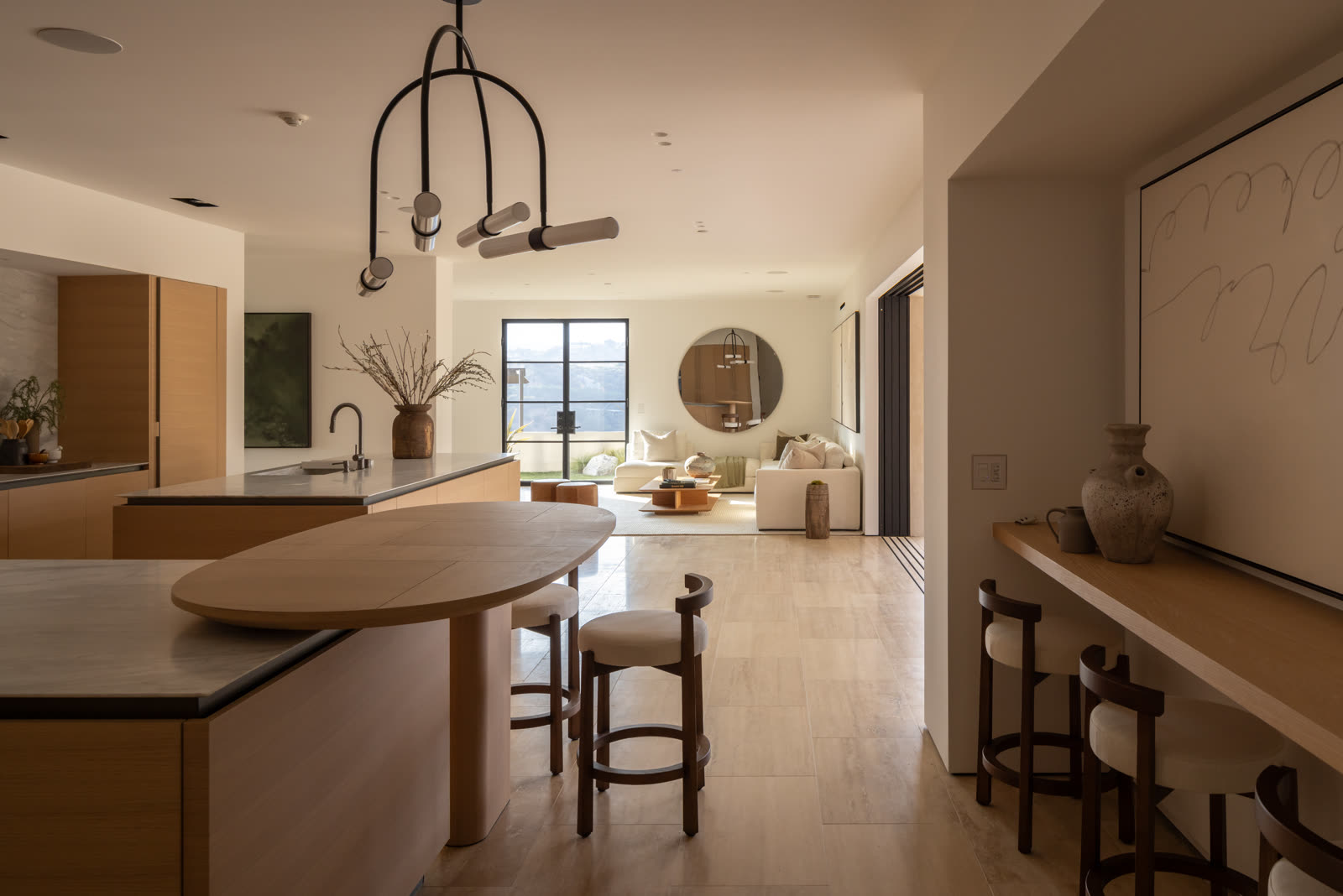 Kitchen with arched window to the ocean