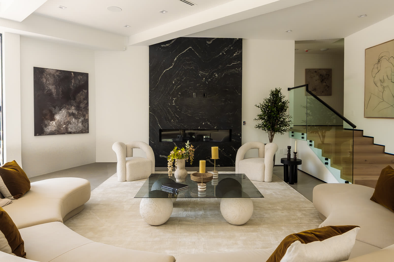 Living room with black marble fireplace